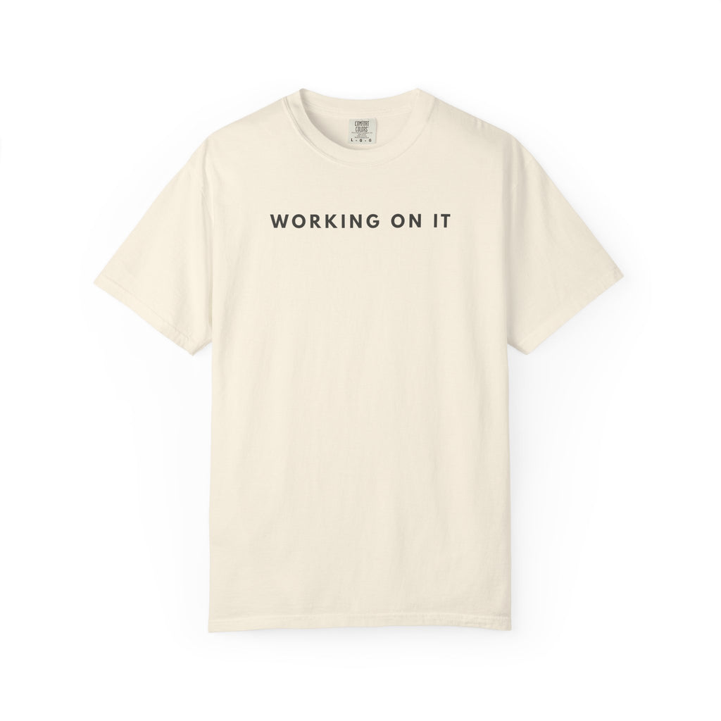 working on it graphic tee in ivory